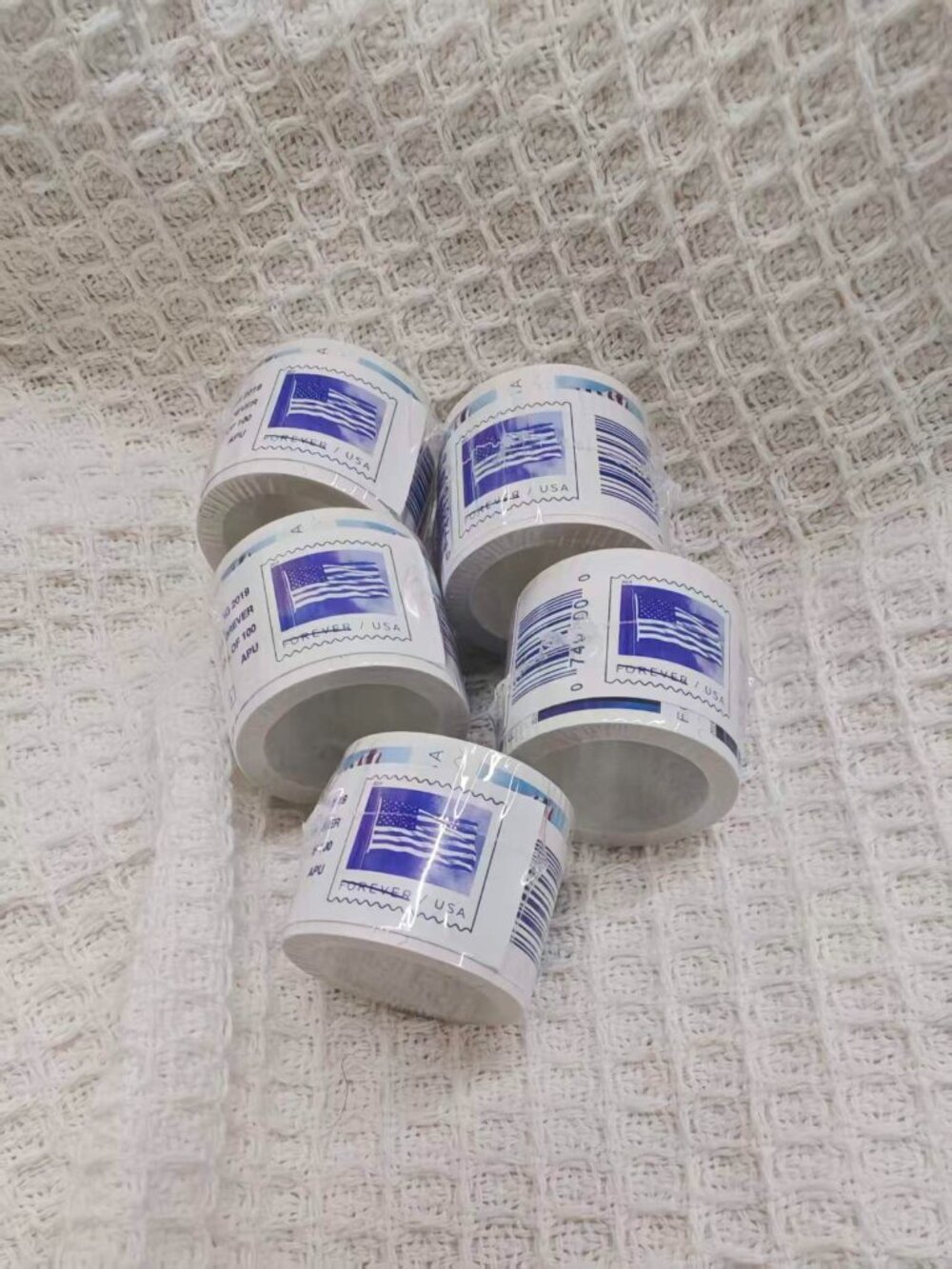 5 rolls of USPS stamps, 500 brand new stamps in total